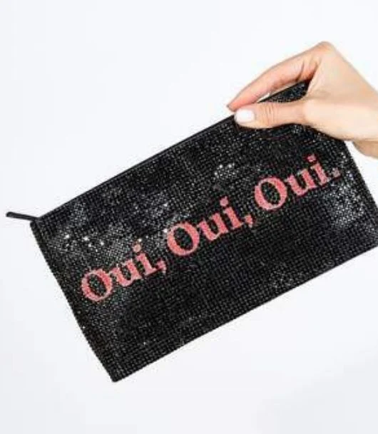 Read more about the article Make A Loud Statement With These Judith Leiber Slogan Pouches!