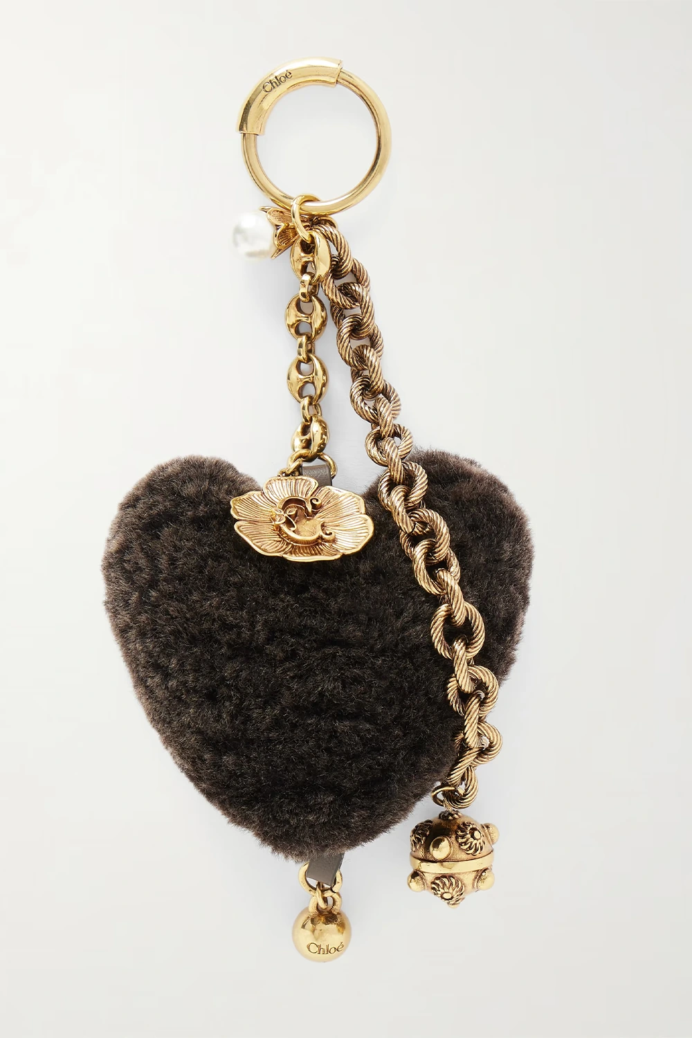 CHLOÉ Shearling and gold-tone bag charm
